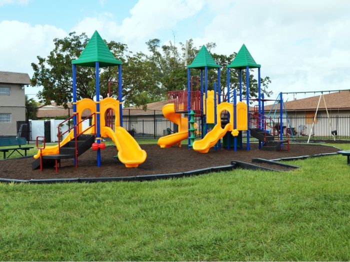 Pompano Palms Apartments, exterior, playground equipment and swing set