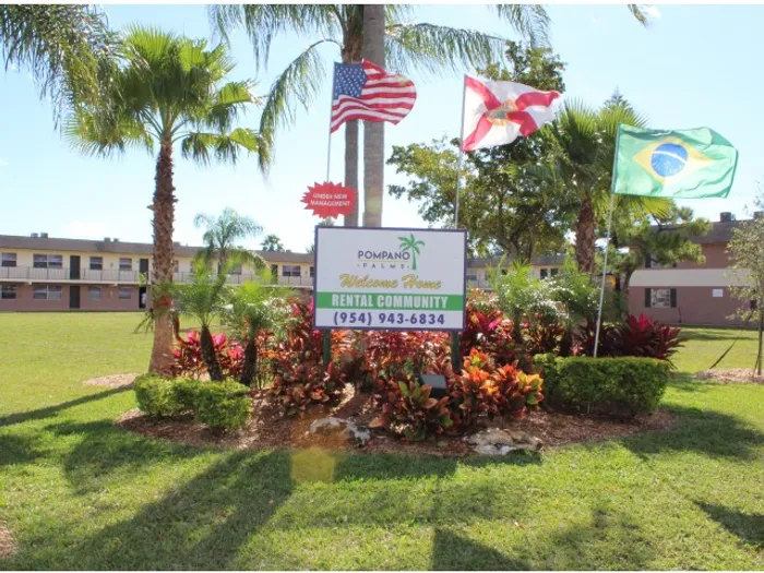 Pompano Palms Apartments, exterior, property sign, phone number 954-943-6834