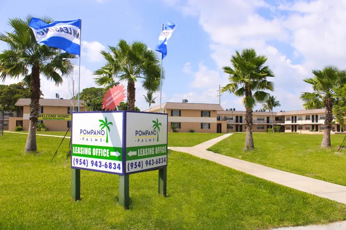 Pompano Palms Apartments, exterior, property sign, phone number 954-943-6834