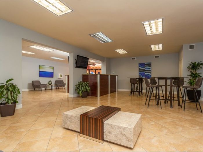 Country Club Towers, interior, clubhouse, spacious seating for entertaining guests