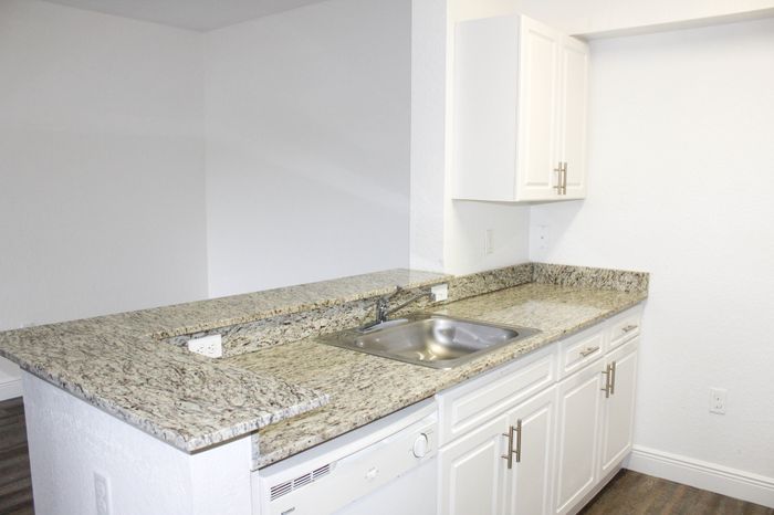 Sunshine Lakes Interior | Kitchen | Sink | Counter | Cabinets