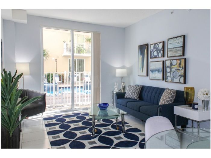 Miami Riverfront Residences, interior, large living area, balcony, poolside view