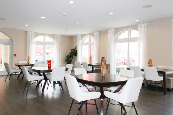 Colony at Dadeland Interior | Clubhouse | Couches | Coffee table | Window views to Parking Exterior