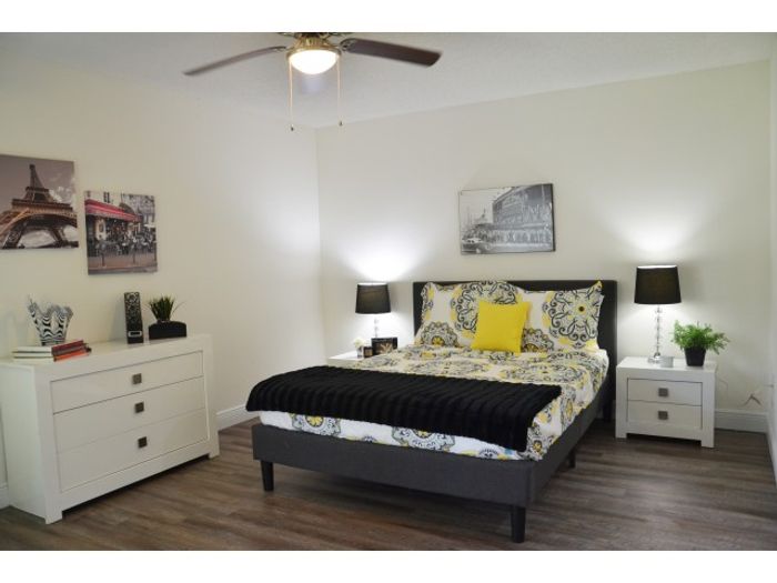 Aventura Harbor Apartments, interior, bedroom, bed, dresser, night stand, carpet