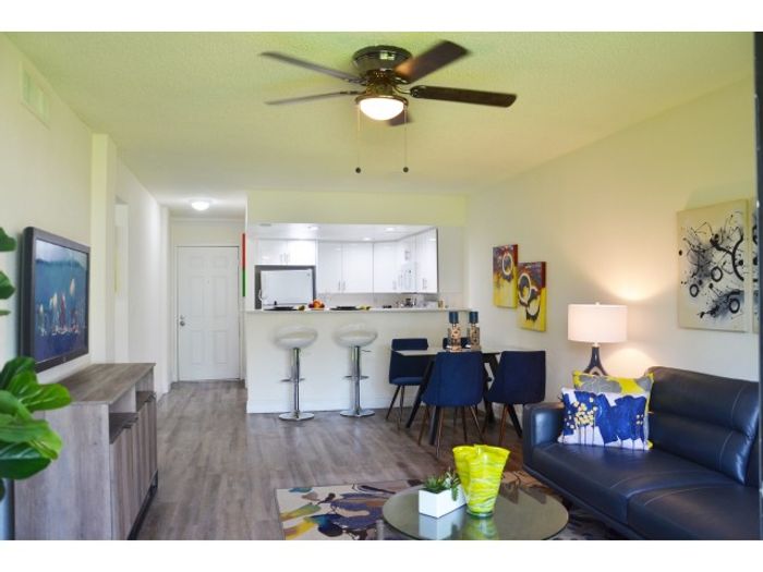 Aventura Harbor Apartments, interior, dining room, living room, large sliding glass door to patio, tile floor