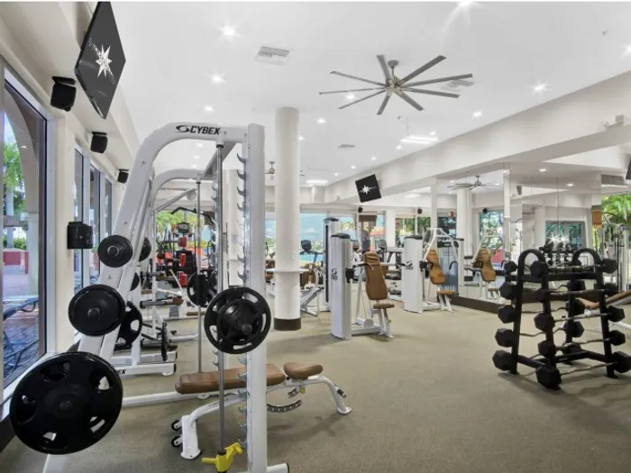 Intracoastal Yacht Club, interior, fitness center, weight machines, large windows