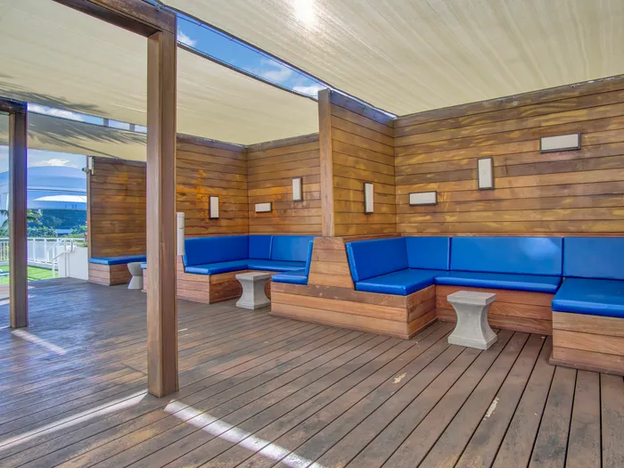 Stadium Tower Exterior | Sun beds | Outdoor lounge areas | Comfortable couches | Cloth covering wood structure