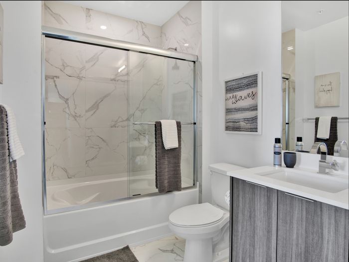 1 Bedroom - Model Unit | Large Bathrooms with Tub & Shower Glass Enclosures