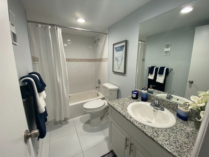 2500 Inverrary Club Apartments, kitchen, granite countertops, white cabinetry, tile floors