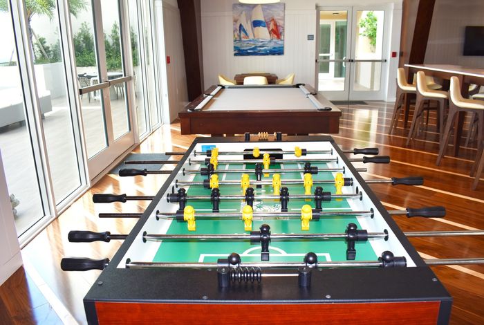 Enjoy a game of Foosball or Billiards