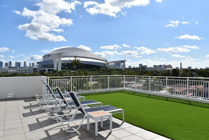 Stadium Tower Exterior | Barbecue deck | Sunbathing chairs | View of surrounding area