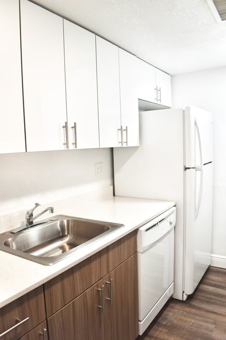 Cherry Grove Village, interior, galley kitchen, white appliances, microwave, stove/oven, refrigerator, dishwasher