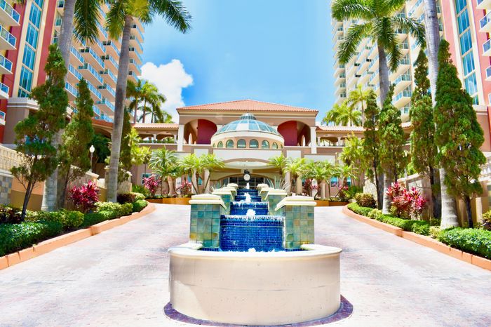 Intracoastal Yacht Club, exterior, entrance, palm trees, fountains