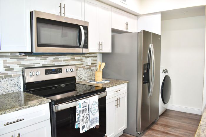 Intracoastal Yacht Club, interior, galley kitchen, stainless steel appliances, microwave, stove/oven, refrigerator