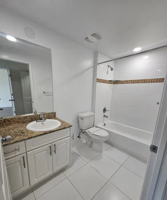 Bathrooms with Granite Counter tops and Large Tubs