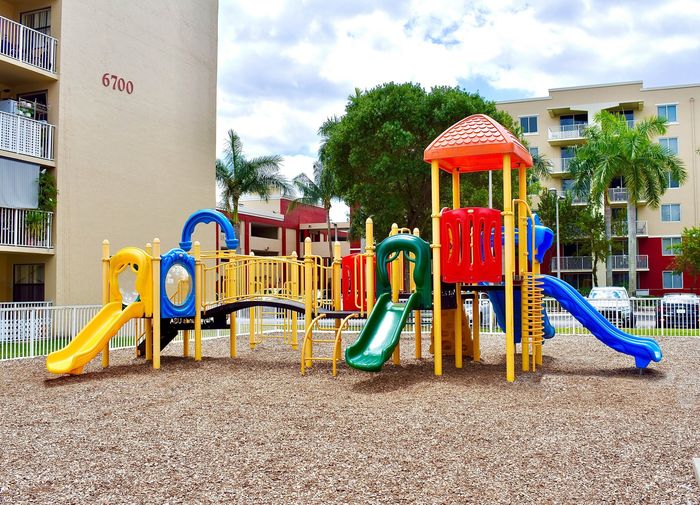 Country Club Towers, exterior, playground equipment, trees