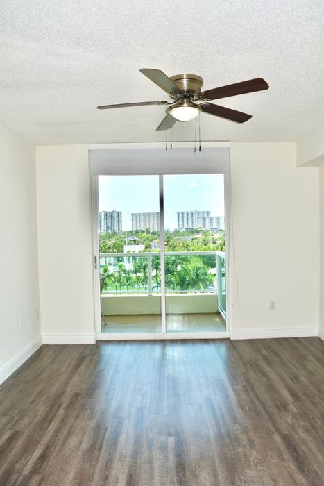 Wood Plank Flooring with Ceiling Fans