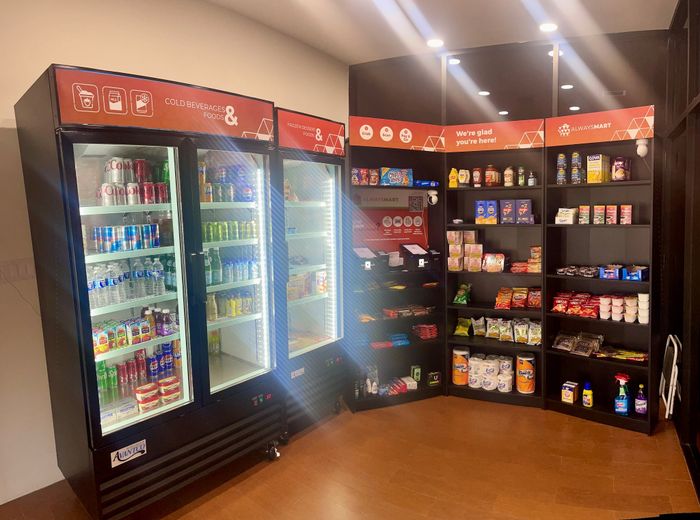 Inviting convenience store corner stocked with a variety of cold beverages, snacks, and essentials, creating a perfect grab-and-go experience.