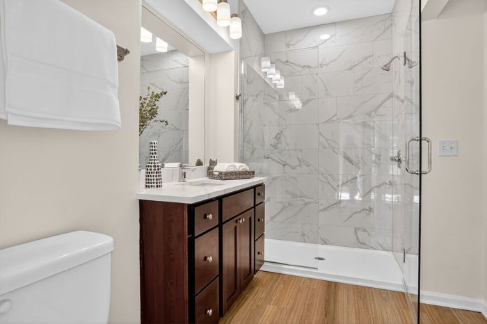 Updated Bathroom with Spa Shower | Luxe at Union Hill | Kansas City, MO Apartments