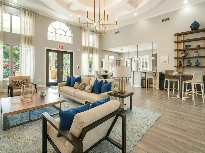 Elegant living space with high ceilings, natural light, modern decor, and open-concept design perfect for entertaining.
