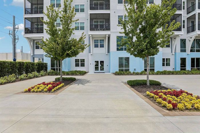 Entrance to Mosaic at Lake Toho apartments in Kissimmee, FL