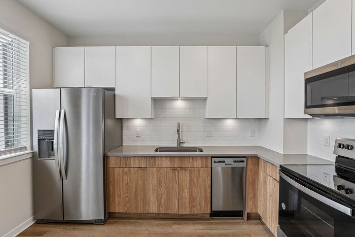 Kitchen at Mosaic at Lake Toho apartments - photo 5