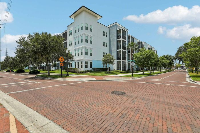 Building exterior at Mosaic at Lake Toho apartments