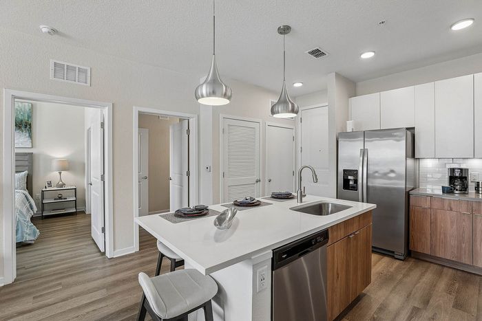 Kitchen at Mosaic at Lake Toho apartments - photo 3