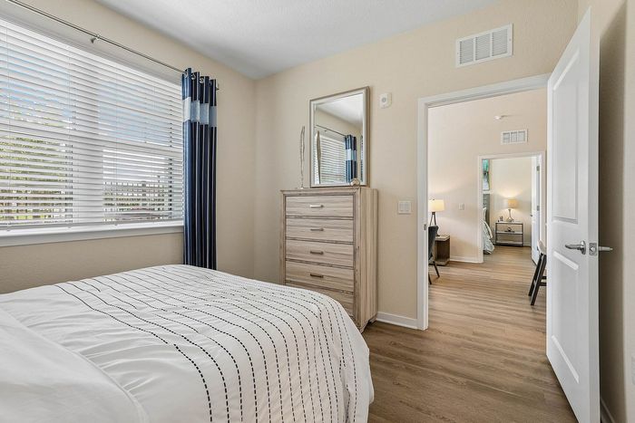 Bedroom at Mosaic at Lake Toho apartments - photo 3
