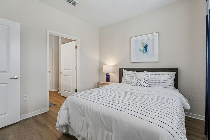 Bedroom at Mosaic at Lake Toho apartments - photo 2
