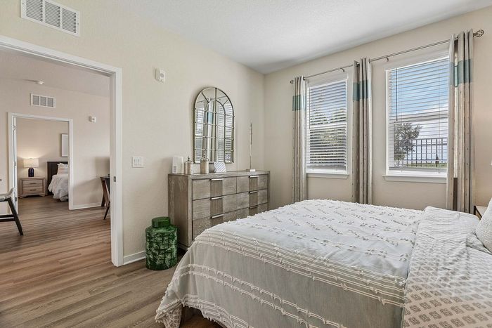 Bedroom at Mosaic at Lake Toho apartments - photo 4