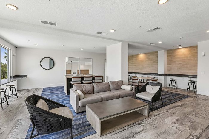 Lounge at Mosaic at Lake Toho apartments - photo 2
