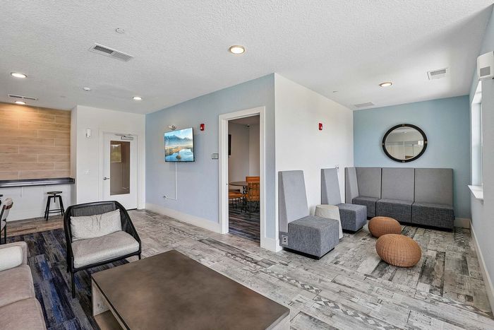 Lounge at Mosaic at Lake Toho apartments - photo 3
