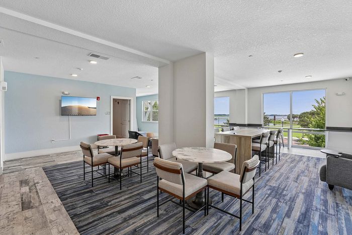 Lounge at Mosaic at Lake Toho apartments - photo 5