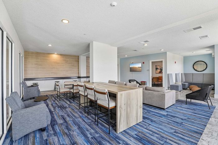 Lounge at Mosaic at Lake Toho apartments - photo 7