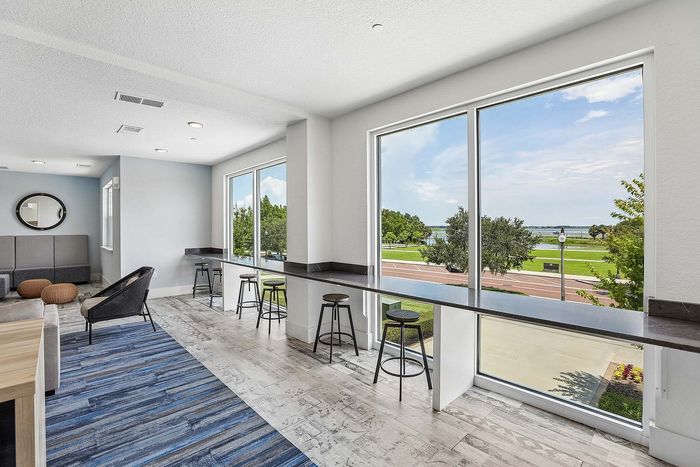 Lounge at Mosaic at Lake Toho apartments - photo 8