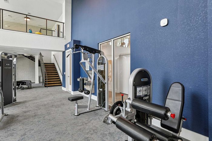 Fitness center at Mosaic at Lake Toho apartments - photo 6