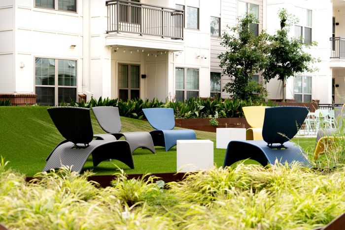 Lounge chairs in outdoor grassy area |  | Paloma West Midtown | Atlanta Student Housing