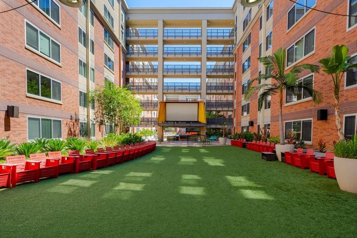 jumbotron outdoor courtyard | University Gateway | LA Student Living