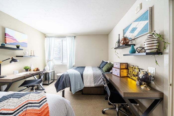 Bedroom with built in desk  | University Gateway Apartments in Los Angeles, CA.
