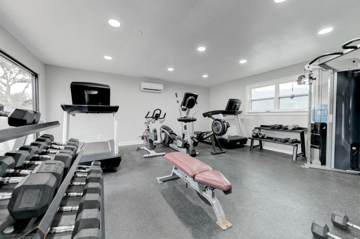 Fitness center  at The Timbers apartments