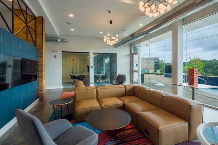 Comfortable Seating in Community Club House | The Bluff at Waterwoks Landing | Apartments in Tuscaloosa
