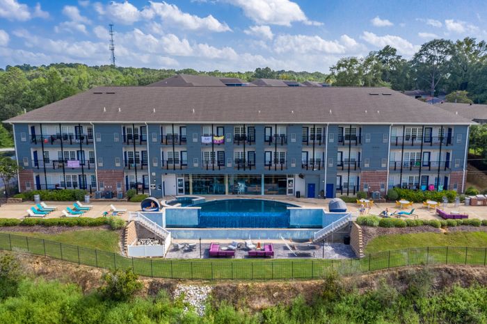 Aerial View Highlighting Fountain - Patio Area | The Bluff at Waterwoks Landing | Tuscaloosa, AL Apartments