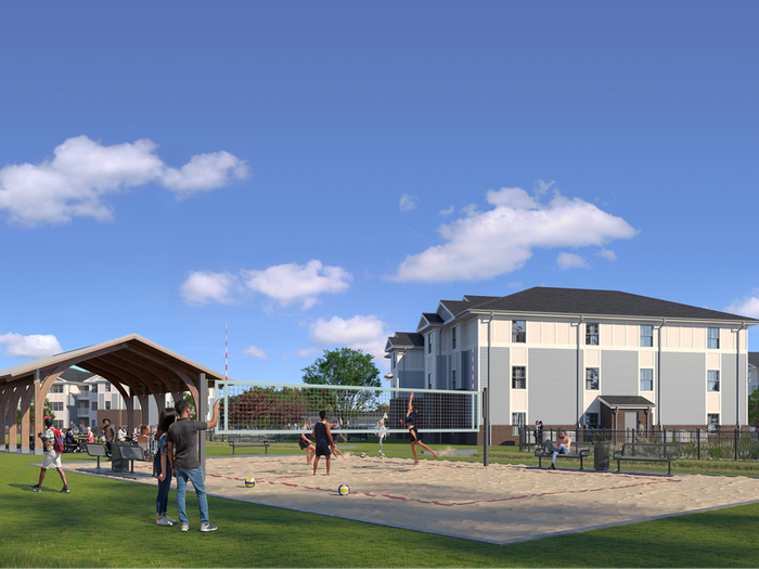 Residents enjoying pavilion and sand volleyball court at 698 Prospect | Apartments in Pembroke