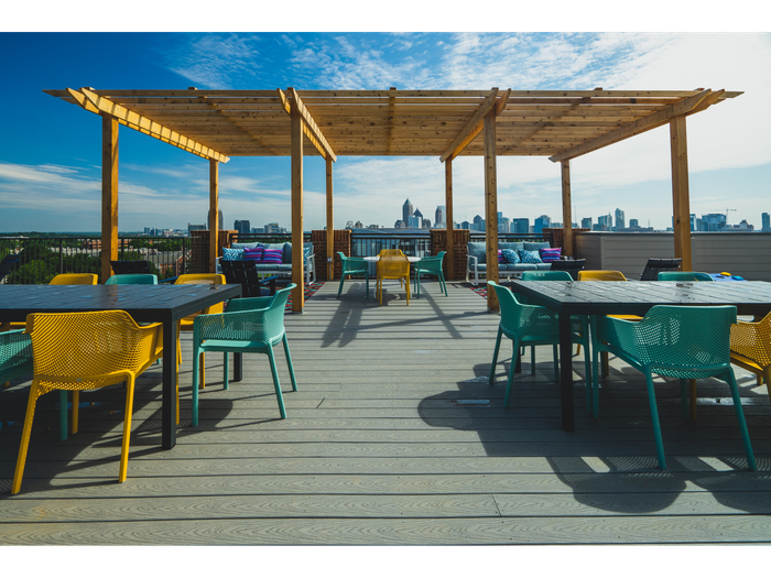 Community Patio Area with Seating and Tables  | Paloma West Midtown | Apartments Near Georgia Tech