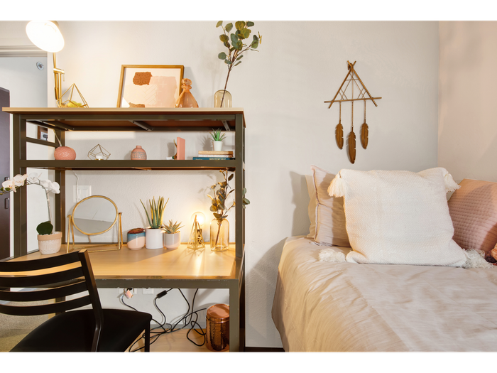 Bedroom with furnishings | University Gateway Apartments in Los Angeles, CA.