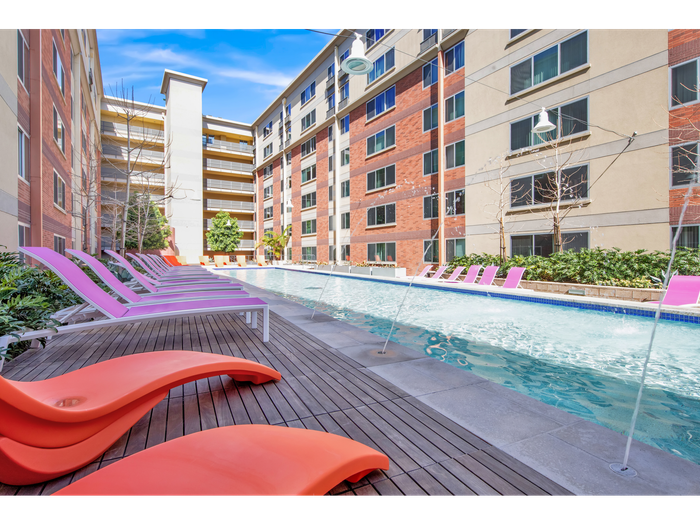 Pool, sun deck, lounge chairs | University Gateway Apartments in Los Angeles, CA.
