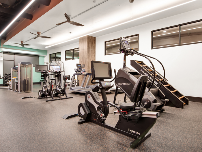 Fitness center with exercise equipment | University Gateway Apartments in Los Angeles, CA.