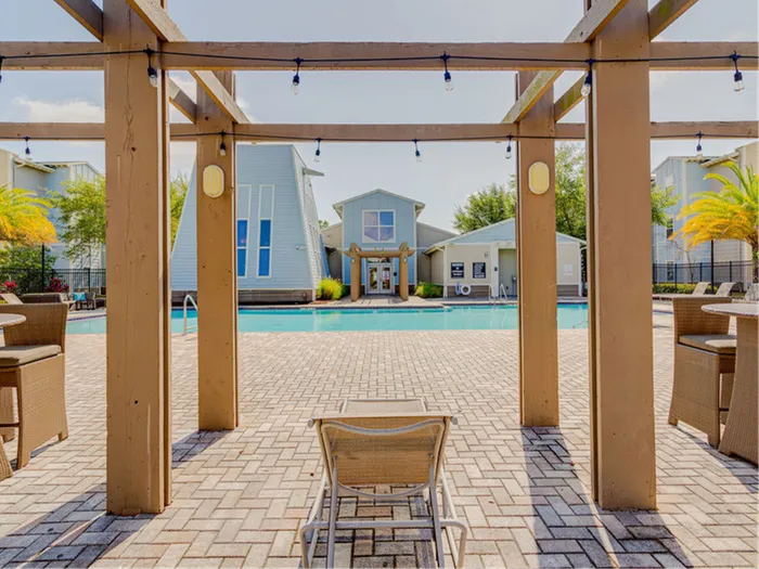 Sun deck, pool, and shade  | Hawks Landing | Apartments in Tampa, FL