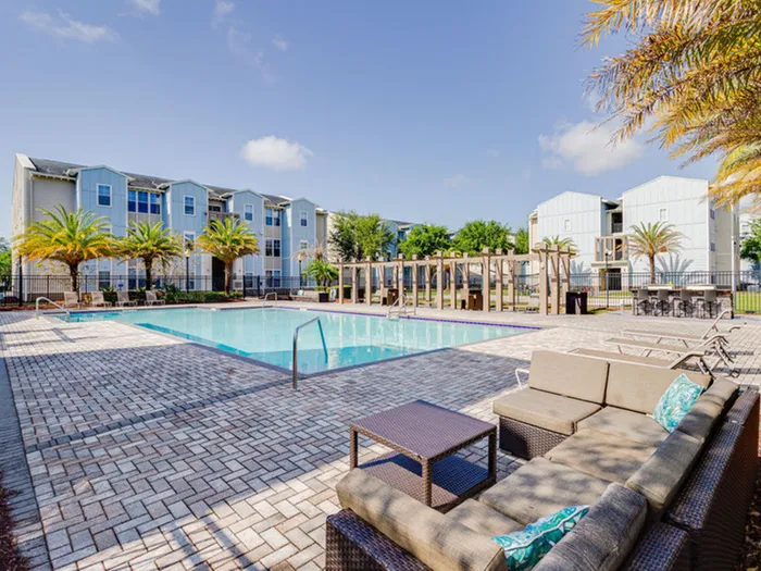Seating on sun deck near pool  | Hawks Landing | Apartments in Tampa, FL